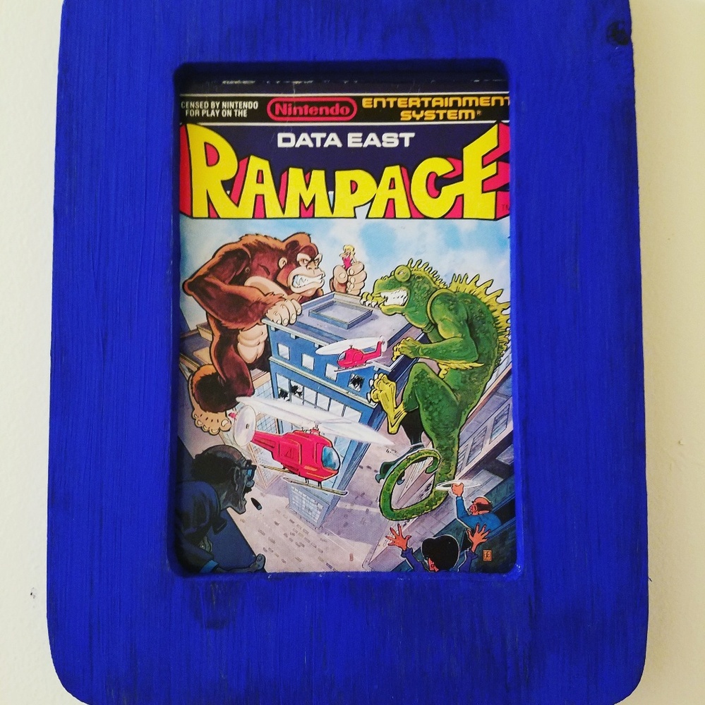 Original Rampafe game cartridge cover in frame